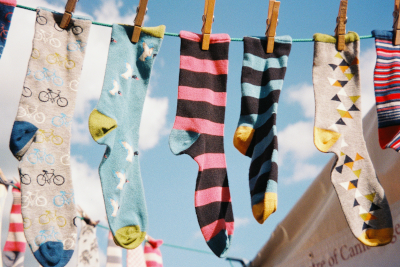 Clothes hung by pegs